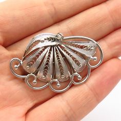 925 Sterling Silver Vintage Filigree Fan Design Pin BroochWeight: 7.2gWELCOME TO PAWN SHOPWe are an actual pawn shop and have been in business for over 25 years.Since 1990, our establishment has been serving a variety of clients by providing them with short term cash solutions and options of liquidity regarding their treasured heirlooms.Acknowledging that today′s customers are very sophisticated and are looking for a variety of investments, our acquisitions are hand-picked for our special client Luxury Engraved Brooches For Gift, Vintage White Gold Brooch With Intricate Design, Antique White Gold Filigree Brooch, Antique White Gold Filigree Brooches, Silver Engraved Victorian Brooches, Victorian Engraved Silver Brooch, Silver Victorian Engraved Brooch, Victorian Engraved Silver Brooches, Victorian Silver Engraved Brooch