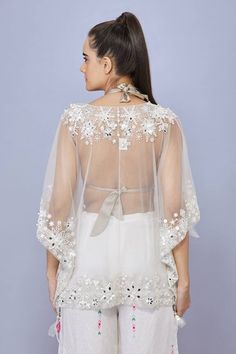 Ivory net kaftan with sequins, pearls and mirror hand embroidered snowflakes. - Aza Fashions White Embroidered Kaftan For Party, White Wedding Kaftan For Festive Occasions, White Embellished Dress With Cape Sleeves, White Festive Wedding Kaftan, Wedding Kaftan With Mirror Work, Festive Wedding Kaftan With Mirror Work, White Kaftan For Eid Party, Wedding Kaftan With Mirror Work And Traditional Drape, Embellished Organza Dress For Celebrations