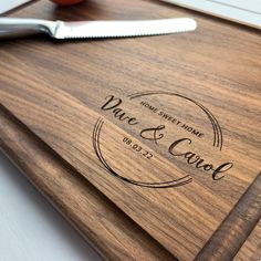 a cutting board with a knife on top of it