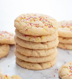 a stack of cookies with sprinkles on top