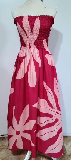 Strapless Tube top Maxi dress.  Pink on magenta pink, TIARE AND FERNS print.  Perfect island wear--Cool and comfortable, dress up or dress down, for an evening out, office attire, or a day at the beach.  Hand made in Hawaii.  Light weight 100% rayon.  One size fits most,  suggest Medium to 2x Mannequin in the photo is a size small.  Hand wash and hang to dry. Hawaiian Prom Dress, Tube Dress Outfit, Tube Top Maxi Dress, Aloha Wear, Island Wear, Strapless Tube Dress, Barbie Costume, Magenta Pink, Vision Boards