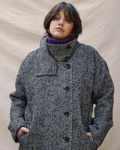 Sizes 00-40. Vintage-inspired and timeless, the Marlo Coat is a true hero piece. Made from a soft and warm wool or custom herringbone tweed, it’s tailored to have a structured cocoon silhouette that feels cozy and not restrictive. It’s a sophisticated take on the everyday wool coat… because everyone needs a small dose of couture in their wardrobe. Details include the funnel neck, dropped shoulders, off-center buttons, and hip pockets. Coat is fully lined. Puffer Vest Fashion, Athleisure Pants, Universal Standard, Weekend Dresses, Cocoon Coat, Herringbone Tweed, Denim Sweater, Ponte Pants, Classic Coats