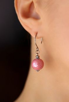 Lovely elegant everyday earrings with pink ceramic 12 mm beads,steel connectors and stainless steel earring hooks. Earring hooks are from nickel and lead free metal. *The total lenght of earrings is about 38 mm including the earring hooks. Other earrings of my shop you can see here: https://www.etsy.com/shop/NaTavelli?section_id=13757927 Thank you for visit! Pink Round Pearl Earrings With Ear Wire, Pink Pearl Earrings With Round Ear Wire, Elegant Pink Round Bead Flower Earrings, Elegant Pink Hypoallergenic Flower Earrings, Elegant Pink Round Beaded Flower Earrings, Elegant Adjustable Flower Earrings With Round Beads, Elegant Pink Beaded Hypoallergenic Earrings, Elegant Pink Hypoallergenic Beaded Earrings, Pearl Earrings Simple