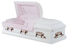 an open white casket with pink sheets and pillows on it's sides, in front of a white background