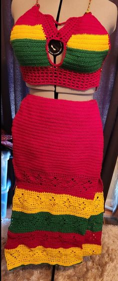 Red /Yellow /Green Criss cross halter and A-line skirt , split on both sides to the the thigh. Skirt - 34in around.  Length- 40in long Halter- adjustable  corset back straps long enough  to wrap back around the front of torso. Fitted Red Skirt For Vacation, Red Fitted Skirt For Vacation, Fitted Red Skirt For Festival, Crochet Long Skirt, Rasta Clothes, Thigh Skirt, Crochet Outfit, Crochet Needlework, Crocheting Ideas