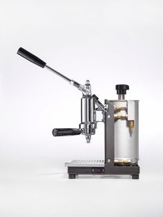 an espresso machine is shown on a white background