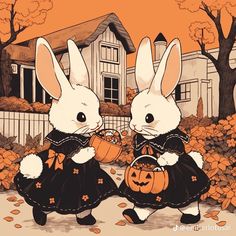 two rabbits dressed in halloween costumes standing next to each other with pumpkins on the ground