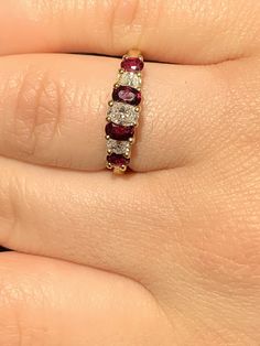 Gorgeous 14k Yellow Gold Diamond and Natural Ruby Ring: Diamonds: 0.42CT Color: G-H Clarity: VS2 Ruby: 0.50CT Total ring weight: 2.7GR 14K Yellow Gold Ring sizing available free of charge For more information regarding this item feel free to reach me so I can accommodate your needs. Thank you Classic Multi-stone Marquise Cut Diamond Ring, Classic Diamond Ring With Multi-stone Marquise Cut, Classic Marquise Cut Multi-stone Diamond Ring, Classic Cluster Gemstone Diamond Ring, Classic Multi-stone Birthstone Ring, Classic Multi-stone Round Cut Diamond Ring, Classic Ruby Diamond Multi-stone Ring, Classic Multi-stone Diamond Rings, Classic Ruby Ring With Vvs Clarity Diamond