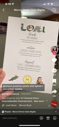 someone is holding up a menu for an event in their hand, with the caption below it