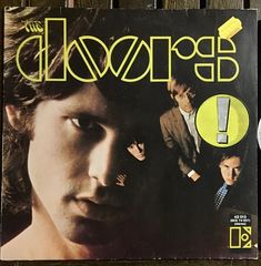 the doors album cover with an image of two men in suits and ties on it