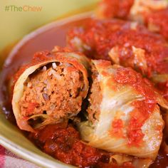 stuffed cabbage rolls with tomato sauce in a bowl