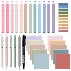 various colored pens and notebooks with hearts on them