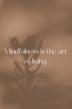 a plant with the words mindfulness is the art of living