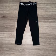 Nike Pro Tight Fit Crop Leggings 21” Inseam Small Mesh Detail Nike Sportswear Leggings For Training, Nike Training Leggings, Nike Training Leggings Sportswear, Nike Tight Leggings For Sports, Nike Tight Sports Leggings, Nike Sports Bottoms, Fitted, Nike Tight Sports Bottoms, Nike Tight Moisture-wicking Bottoms, Nike Fitted Yoga Pants For Running