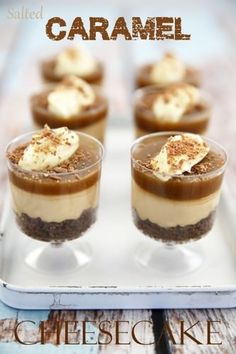 small desserts are arranged in individual cups on a tray