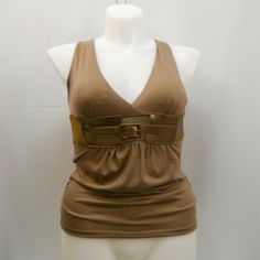 Annabelle Women's Halter Top Empire-Waist Ruched-Sides Solid Brown Size L Fabric: 65% Polyester 32% Rayon 3% Spandex Color On Tags: None Wash Instructions: Hand Wash Neck Type: Halter Waist Type: Empire Sleeve Type: Sleeveless Pockets: None Special Details: Padded Bust; Attached Belt B: 34” W: 32” Bl: 25” 15-70222 Lc 2570 # B 20 Chic Fitted Belted Top, Casual Fitted Corset Belt For Summer, Casual Summer Corset Belt, Womens Halter Tops, Junior Fashion, Solid Brown, Women Halter, Flutter Sleeve Top, Long Crop Top