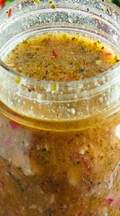 a jar filled with food sitting on top of a table