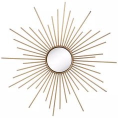 a mirror that is sitting on top of a wooden stick wall mounted sunburst