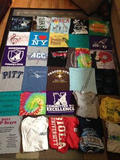 there are many t - shirts laid out on the floor