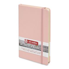 a pink sketch book on a white background