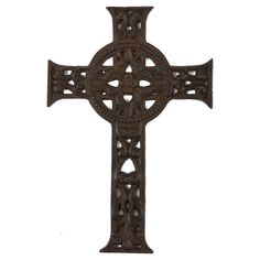 an ornate iron cross on a white background