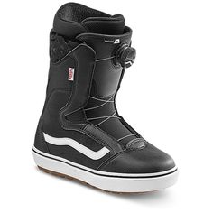 a pair of black snowboard boots with white soles