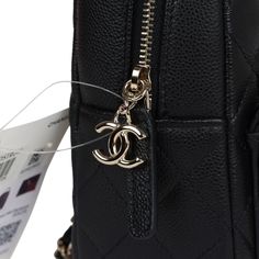 This mini Phone Holder Backpack with Chain is in black caviar leather with light gold hardware, features a backpack style bag, small front snap coin pocket with CC logo, leather top handle, zip around closure with leather pull and CC logo charm, convertible light gold tone chain interwoven with black leather crossbody/shoulder strap.The interior is lined in burgundy fabric and features a two credit card slots.Collection: 24COrigin: ItalyCondition: New and never wornAccompanied by: Chanel box, Ch Chanel Box, Chanel Mini, Black Caviar, Birkin 25, Leather Pulls, Phone Holder, Leather Top, Gold Hardware, Exclusive Bag