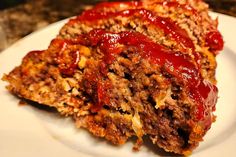 meatloaf with ketchup on a plate ready to be eaten or eaten