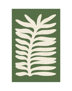 a green and white print with leaves on it's back side, in the shape of a leaf