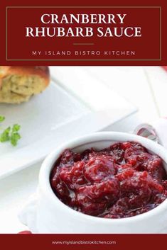 cranberry rhubarb sauce in a white bowl on a red and white plate