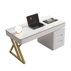 a desk with a laptop on it and a lamp next to it, in front of a white background