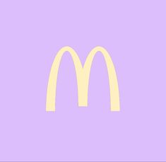 a mcdonald's logo on a purple background