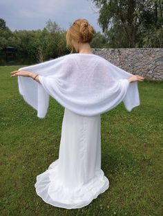 Lightweight cape chaff will complement your image of the bride. The scarf of angora is handmade can be worn after the event as white is a universal shade. The cape is very soft and delicate, and most importantly will keep you warm on a chilly evening. The product is made of natural yarn possible slight hair loss (this is inevitable). hand wash in cool water, dry away from the radiator in a horizontal position Composition: 100% angora (rabbit) Hand knit Wedding Shrug, Shrugs And Boleros, Bridal Cape, Angora Rabbit, Wedding Wraps, Wrap Scarf, Scarf Wrap, The Bride, Hand Knitting