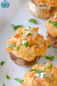 small appetizers with cheese and parsley on them