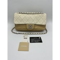 This Is A Rare Bicolor Medium Chanel Classic Flap Bag Quilted Lambskin Neutral Beige White/Cream. Made In 2008-2009. Silver Hardware. This Two Tone Color Scheme Is Very Hard To Find. Shoulder Or Hand Bag, Straps Could Be Doubled, Or Lengthened. Comes With Original Price Tag, Authenticity Card, And Care Booklet. This Is A Preowned Bag That Was Originally Beige And White And It Has Been Customized. It Has Been Professionally Repainted, Restoring It To Match The Original. The Original Bag Had Some Light Staining, Fading And Normal Wear Consistent With Light Use. The Professional Restoration Fixed Those Flaws And The Bag Looks Amazing Now. There Is Some Loss Of Structure Of The Leather As Expect Chanel Classic Flap Bag, Classic Flap Bag, Neutral Beige, Original Bags, Classic Flap, Price Tag, Flap Bag, Grey Fabric, White Cream