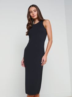 She's incomparably chic and effortlessly wearable. The Nura midi dress offers a sleek, fitted silhouette for figure-flattering definition. The lush microfiber modal smooths and slims, elongating the figure. Cutaway armholes and subtle racerback add a modern touch. Pair with a clean mule for a elegant, understated look. | L'AGENCE Nura Sleeveless Midi Dress In Black Sleeveless Midi Dress, Fitted Silhouette, Little Dresses, Fall Shopping, Midi Dress Sleeveless, Black Midi Dress, Spring Collection, Mule, Jumpsuit Dress