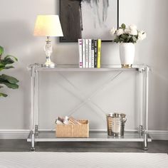 a living room scene with focus on the table and vases, bookshelf and plant