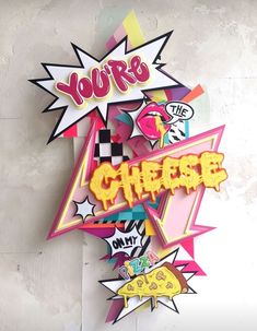 there is a sign that says you're cheesy on the side of a wall