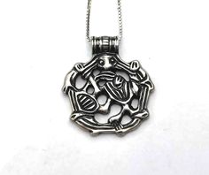 Size pendant: 2,5 x 3 cm,   1.18 x 0.78 inch.  925s, Sterling silver. Chain: 41 cm,  16.14 in. 925s, Sterling silver.  Pendant, griffin in the Borre style, inspired by a Norwegian find from the Viking age. 900 A.D. Sigmund Espeland AS at Årnes is one of Norway's largest manufacturers of gold, bronze and silver jewelery. In the jeweler industry, the company is known for its wide range of quality products. Snorre Viking jewelry was created by partial copy of discoveries from about 300 - 1000 AD, a Silver Viking Necklace With Oxidized Finish, Viking Style Sterling Silver Nickel-free Necklace, Nickel-free Viking Style Sterling Silver Necklace, Nickel-free Sterling Silver Viking Necklace, Viking Style Sterling Silver Pendant, Viking Sterling Silver Pendant Jewelry, Viking Style Sterling Silver Pendant Jewelry, Viking Style Silver Round Pendant Necklace, Viking Style Sterling Silver Round Pendant Jewelry