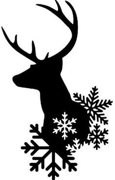 the silhouette of a deer with snowflakes on it's antlers is shown