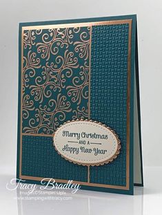 a blue and gold christmas card with the words merry christmas, happy new year on it