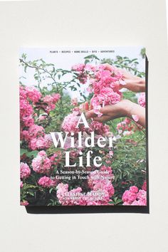 a book with pink flowers on the cover