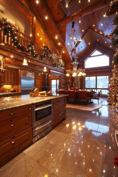 the kitchen is decorated for christmas with lights