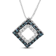 Unlike your usual oval or heart-shaped pendants, this rhombus piece is an unexpected standout. Made up of two geometric-shaped pendants featuring 36 natural round diamonds that are in white and colour-treated in blue respectively, the stones weigh a total of 1/2 cttw. While the colour combination of the diamonds adds that extra charm to the overall look, the contrasting sterling silver prong settings also undoubtedly add to its appeal. Cinched onto a .925 Sterling Silver rope chain, it’s finishe Diamond-cut Diamond-shaped Necklaces, Diamond White Necklace With Diamond Markers, Anniversary Diamond-shaped Necklace With Diamond Accents, Diamond-shaped Necklace With Diamond Accents For Anniversary, Anniversary Necklace With Black Diamonds, Diamond-shaped Necklace With Diamond Accents, Rhombus Design, Silver Rope Chain, Rope Chain