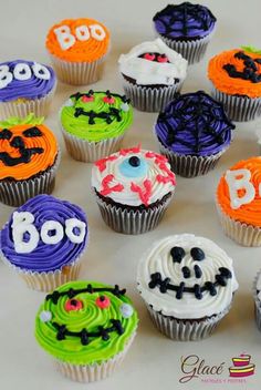 there are many cupcakes decorated to look like halloween