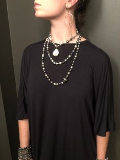 132 South Sea, Tahitian, and Akoya pearls are hand-knotted on silk. A rare “cake-pop” Baroque pearl hangs central to this necklace. Can be worn long, doubled, or three times around the neck. No clasp. 66" with 1.5" drop. Double Strand Pearl Beaded Necklace With Pendant, Elegant Multi-strand Mother Of Pearl Jewelry, Double Strand Pearl Chain Beaded Necklaces For Layering, Multi-strand Pearl Necklaces With Pearl Charm, Elegant Multi-strand Mother Of Pearl Necklace, Elegant Multi-strand Mother Of Pearl Necklaces, Multi-strand Pearl Drop Necklace, Elegant Double Strand Beaded Necklace With Pearl Drop, Elegant Double Strand Beaded Necklace With Pearl Charm