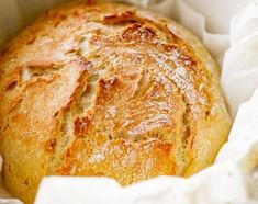 a loaf of bread in a paper bag