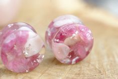 Raw Pink Tourmaline and Pink Opal Resin Plugs - Ear Gauges with 925 Silver Flakes I love to borrow rich seemingly chaotic forms and colors from the natural world, pieces of micro habitat, the world in miniature, the little reminders of our true place Nature is always amazing, brings us brightness and good vibrations, reconnects us with earth energies. Ear Plugs come in sizes 10mm to 50mm choose your size from drop down menu Make sure you have selected PAIR if you are buying two ear plugs, SINGLE Opal Resin, Raw Pink Tourmaline, Stone Plugs, Amber Resin, Handmade Packaging, Ear Tunnels, Plug Earrings, Crystal Resin, Good Vibrations