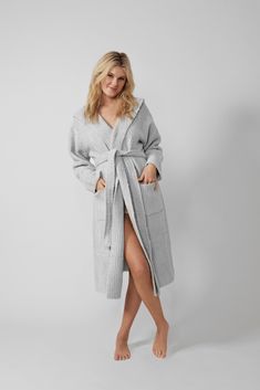 Meet the stylish robe of your dreams, crafted from our signature Snug fabric. With a hood to keep you cozy, a removable waist tie, and on-trend ribbed texture, this multipurpose robe doubles as a cardigan - perfect for those late night grocery runs. Made from our signature Snug fabric Features pockets Removable waist tie Machine washable OEKO-TEX® certified Cozy Hooded Robe For Loungewear, Cozy Winter Robe For Lounging, Cozy Robe For Lounging In Winter, Cozy Winter Lounging Robe, Winter Loungewear Robe With Shawl Collar, Cozy Winter Robe For Daywear, Baby Bow Hats, Delivery Gown, Nursing Wear