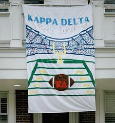 a banner hanging from the side of a building